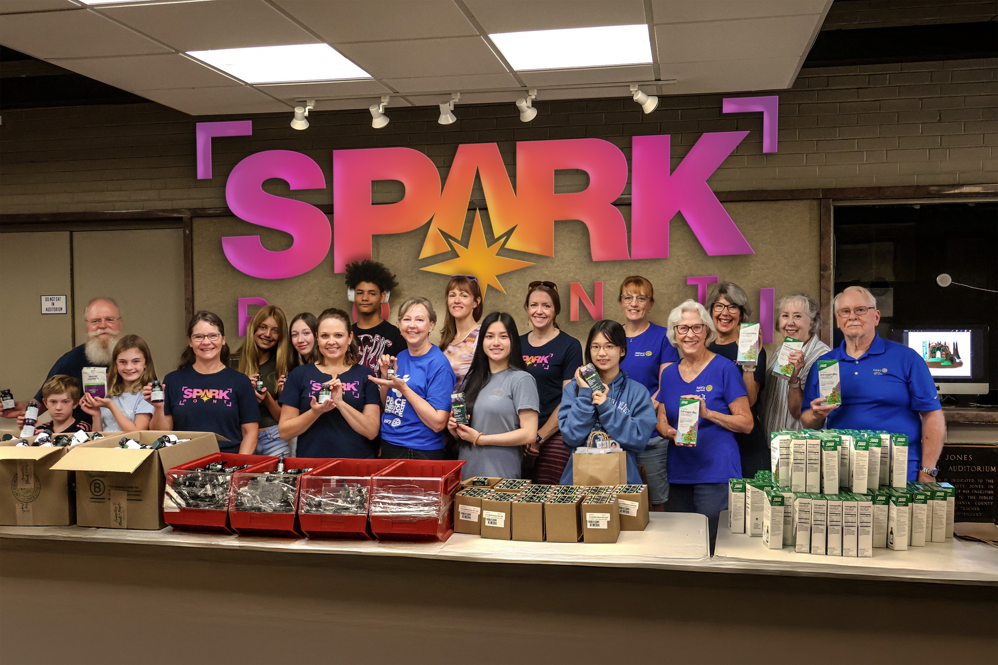 SparkPoint and partners packing wellness packs