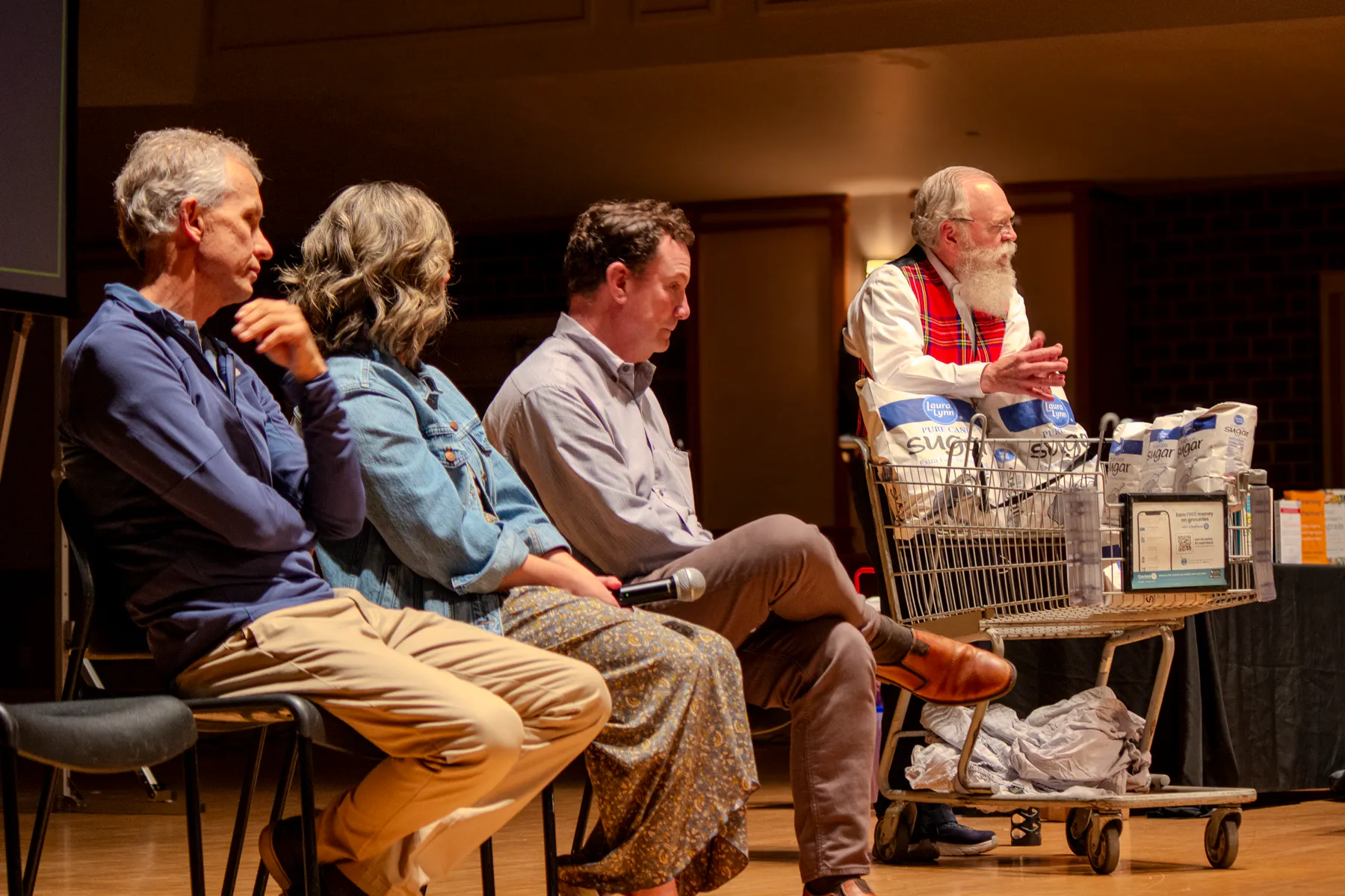 Dr. Ora Wells and panelists on stage during the Brain Health talk