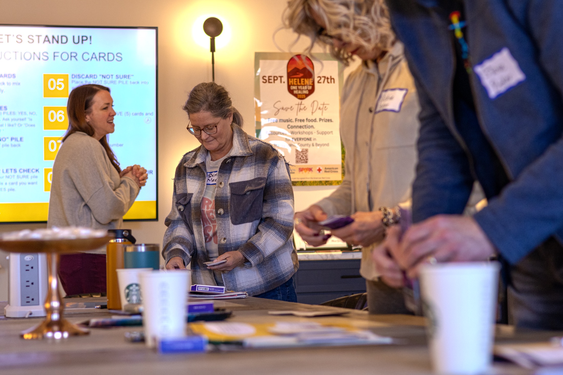 Participants gathered together during a SparkPurpose workshop activity.
